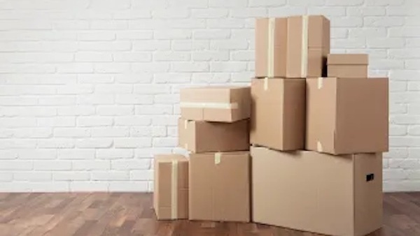 Pile of boxes with white wall background