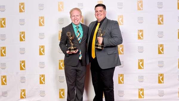 Zack, on right, with his Emmy
