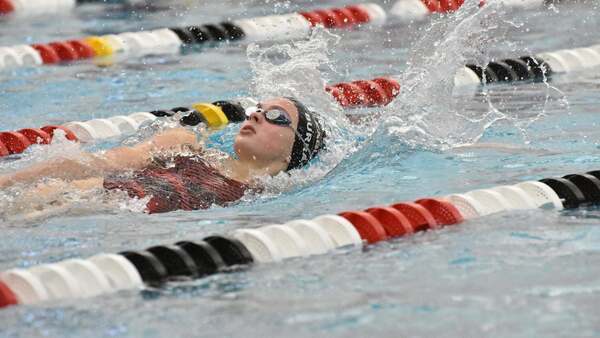 Dover female swimmer in action