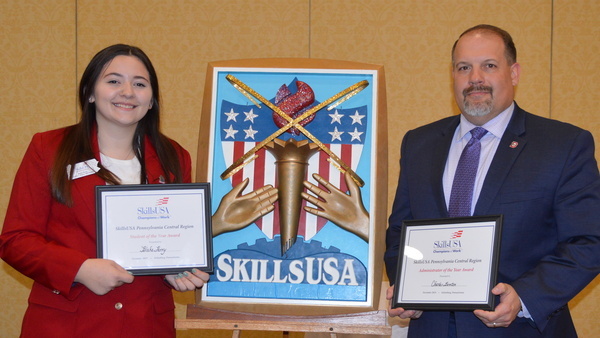 Mr Benton and student receiving SkillzUSA awards