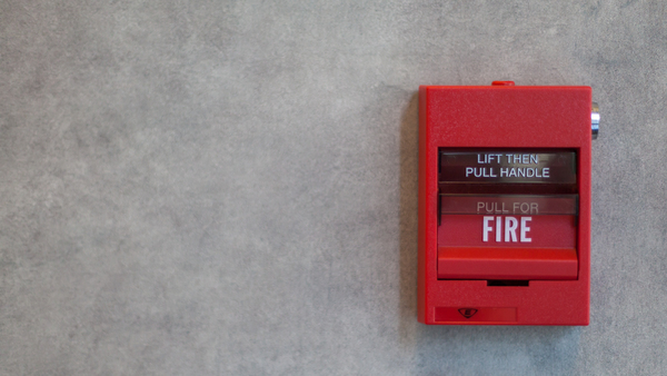 Fire pull station on a wall