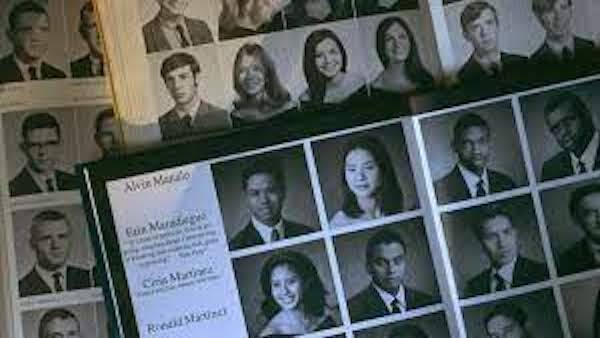 black and white image of yearbook pages