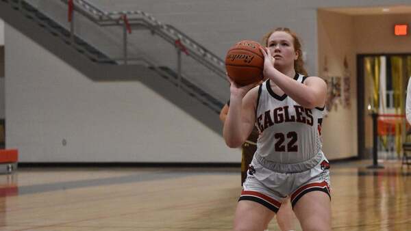 Dover girls basketball player taking a free throw shot