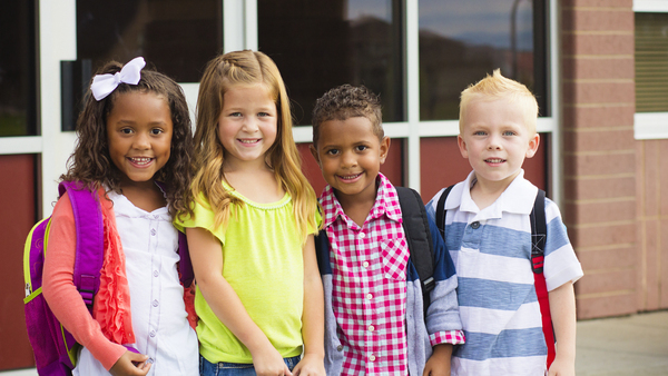 Group of elementary students facing the camera