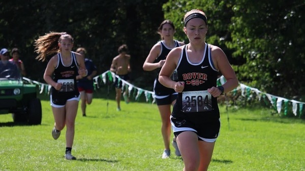 Dover girls cross country runners heading towards camera