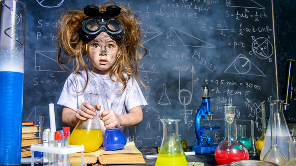 Young female looking stunned as science experiment went wrong