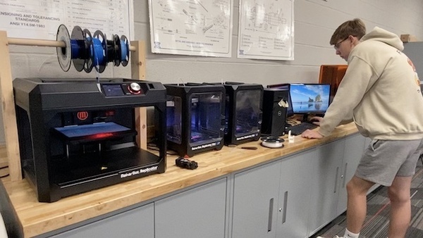 Student using 3D printers