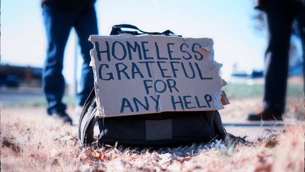 Homeless grateful for help sign