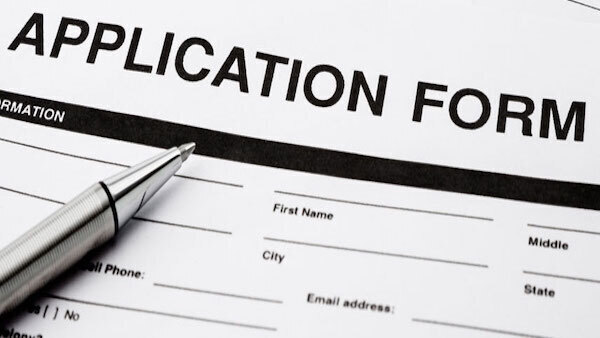 Application form with pen on it