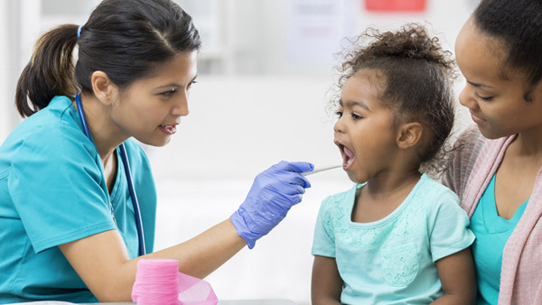 Nursing checking a young girl