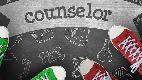 red and green sneakers on chalk drawings with the word counselor written out.