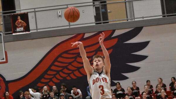 Dover HS player shooting the ball